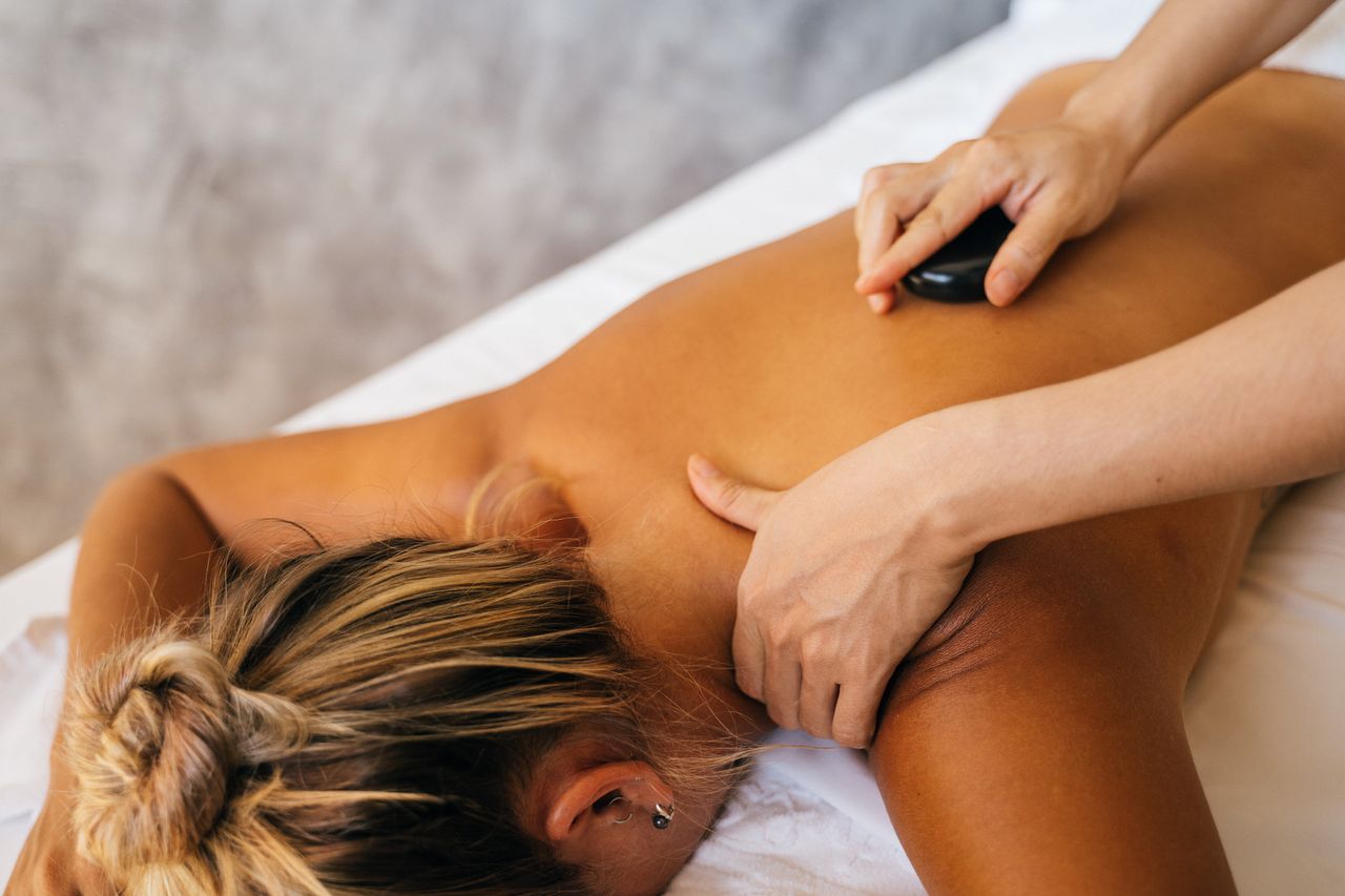 services-04 Experience deep relaxation with a hot stone massage, enhancing your wellness journey.