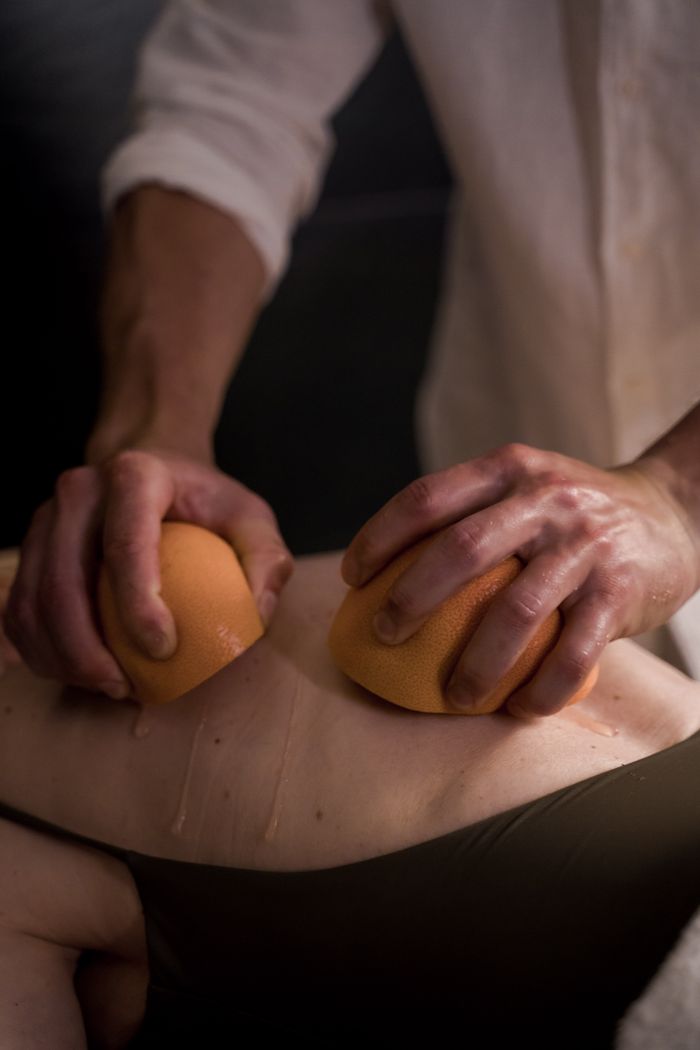 contact-img Relaxing spa experience with citrus fruit massage for wellness and stress relief.